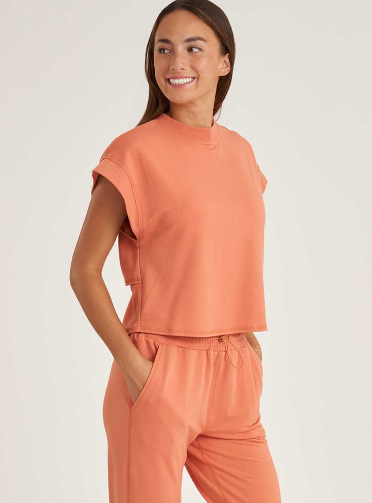 
                      
                        Thrive Société Women's Comforted Twist Back Pullover Shirt - Ochre Orange
                      
                    